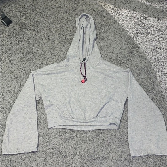 A grey crop top hoodie. - Picture 1 of 2